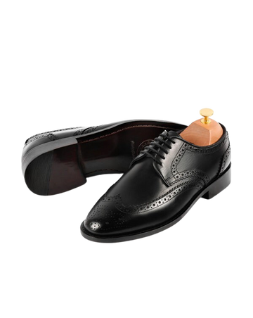 Medallion wingtip derby black crust