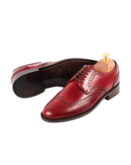 Medallion wingtip derby burgundy crust