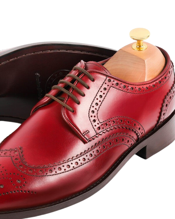 Medallion wingtip derby burgundy crust