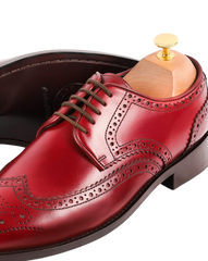 Medallion wingtip derby burgundy crust